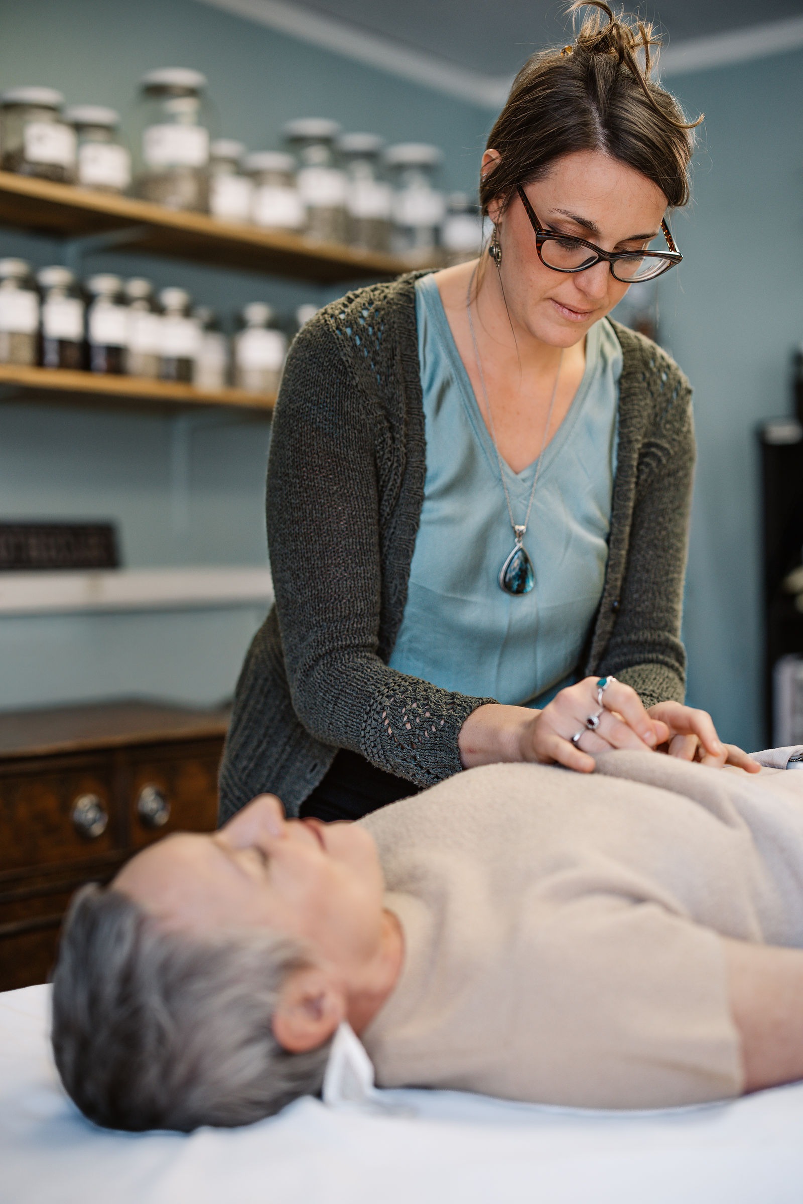 Dr. Elena performing acupuncture
